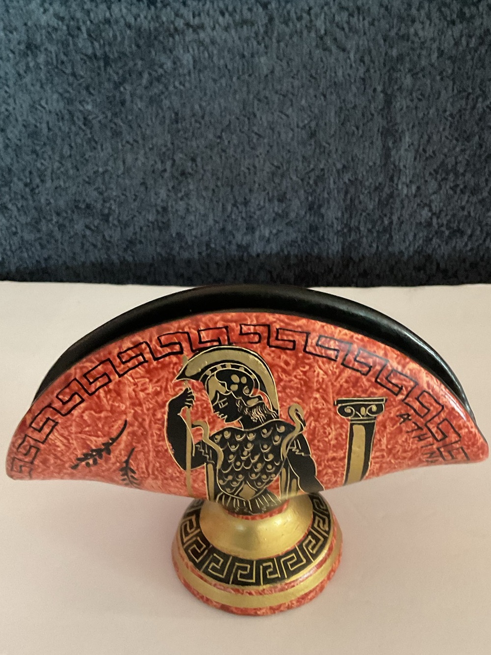 Decorative Red and Gold Ceramic Napkin Holder with Scroll Motif.